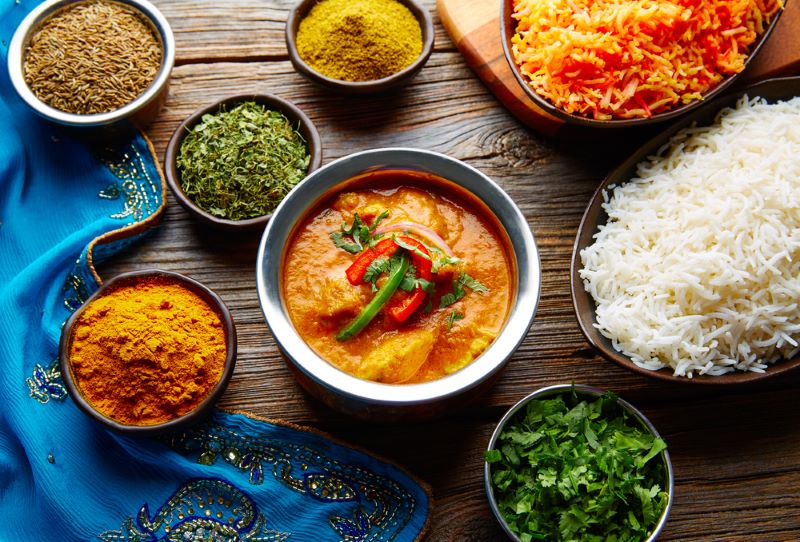 Cuisine indienne à base de curry et de poulet, livrée par Kitchen Trotter